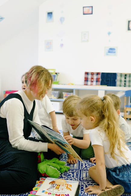 A teacher reading to an attentive group of children in a cozy classroom setting.
